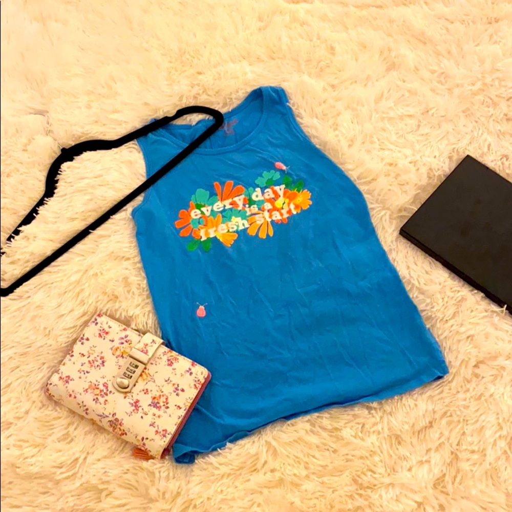 This is a fun tank top the size is a 10/12 kids
